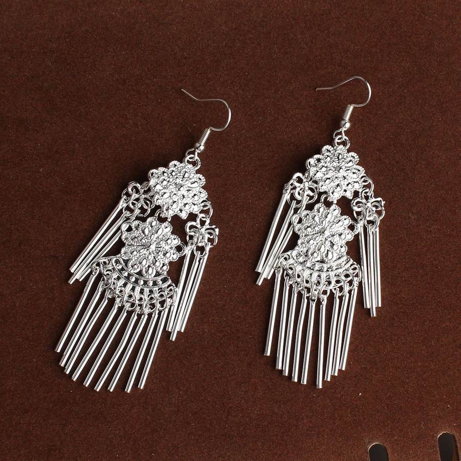Filigree silver earrings with hanging tubes