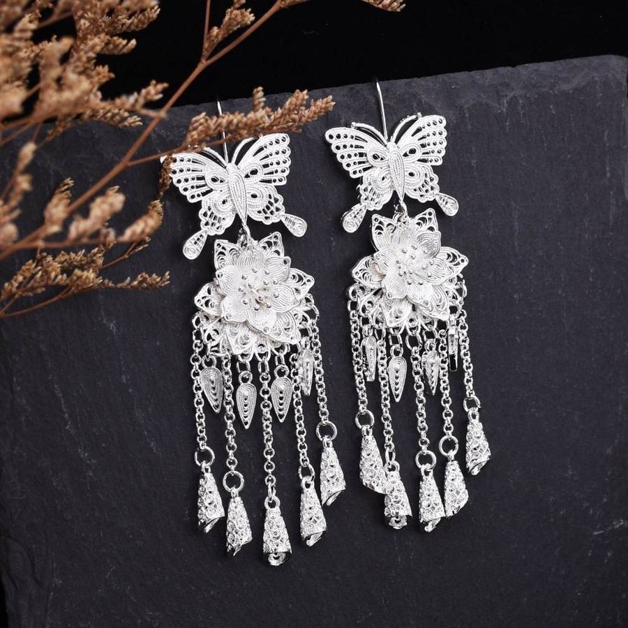 Filigree silver butterfly earrings with tassels